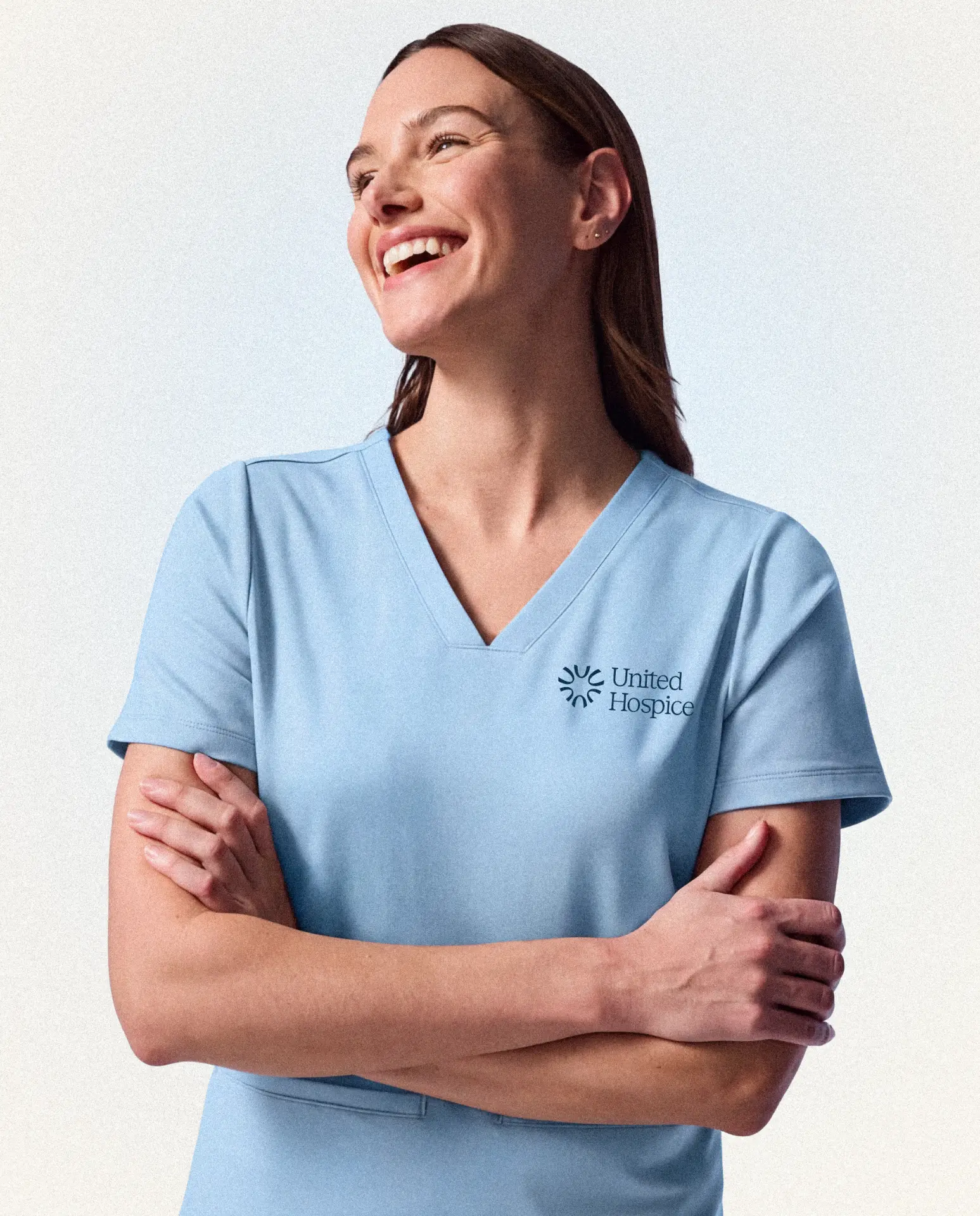 A nurse checking in with a patient at home